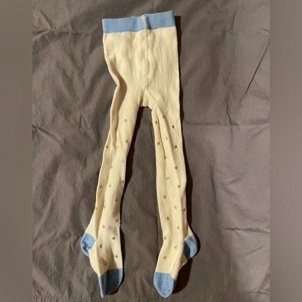Baby Boden white knit tights with gold stars